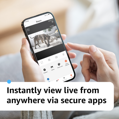 Phone showing a live view of a dog in the camera app, with playback and motion detection controls.