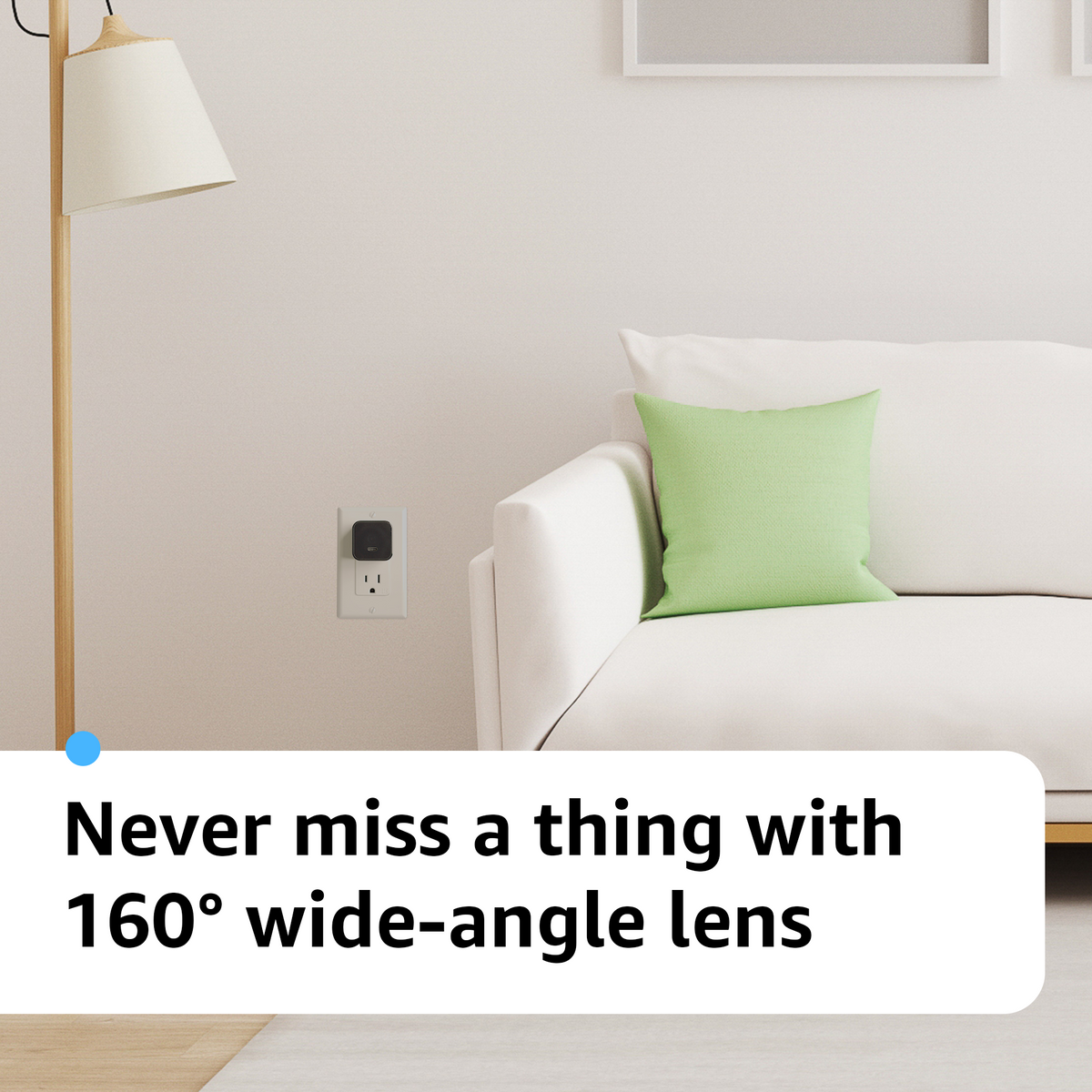 USB-C Wi-Fi camera in a wall outlet beside a sofa; 160° wide-angle lens for indoor viewing.